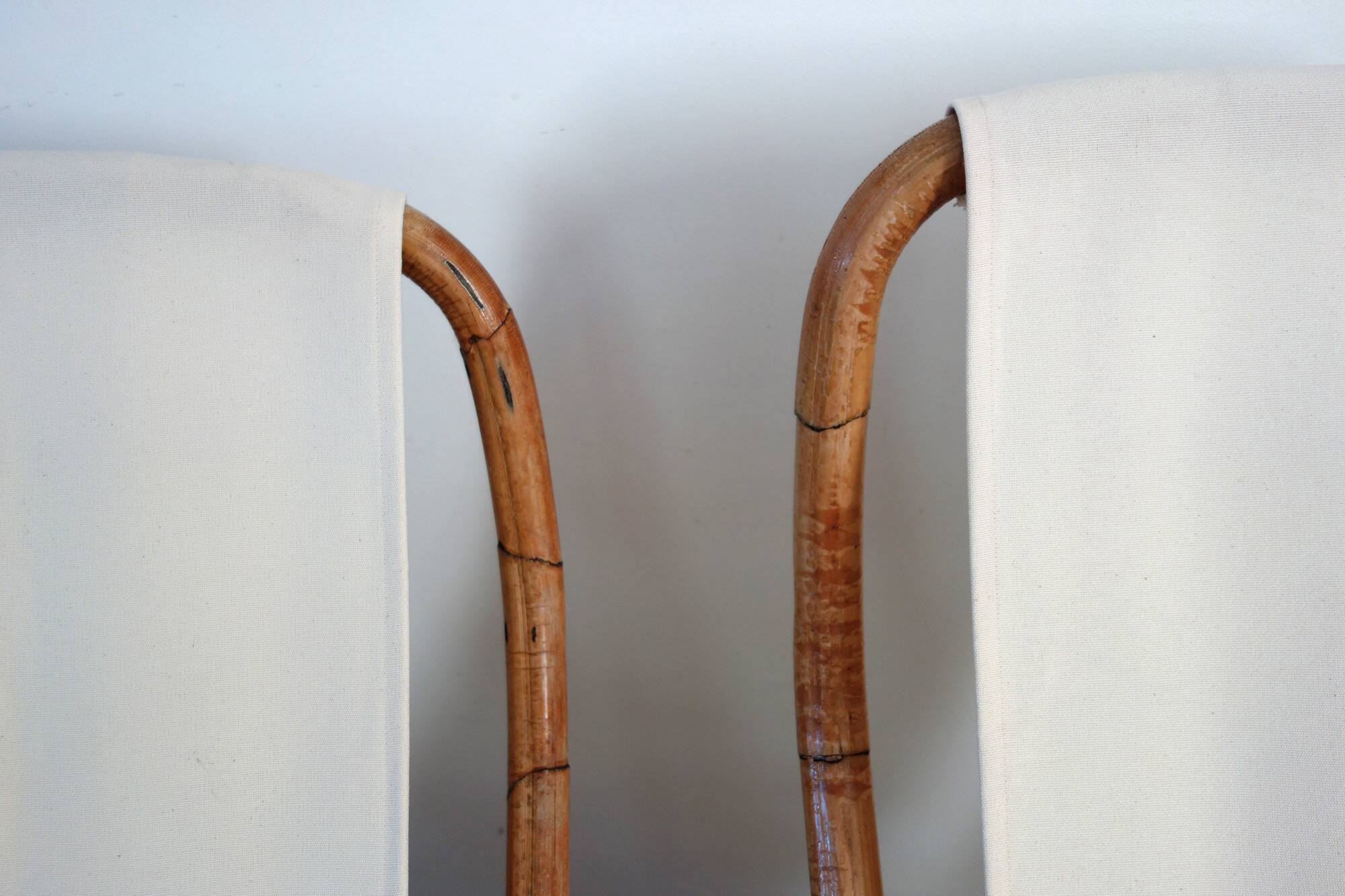 Pair of folding bamboo and brass deck chairs, Italy, 1960s.