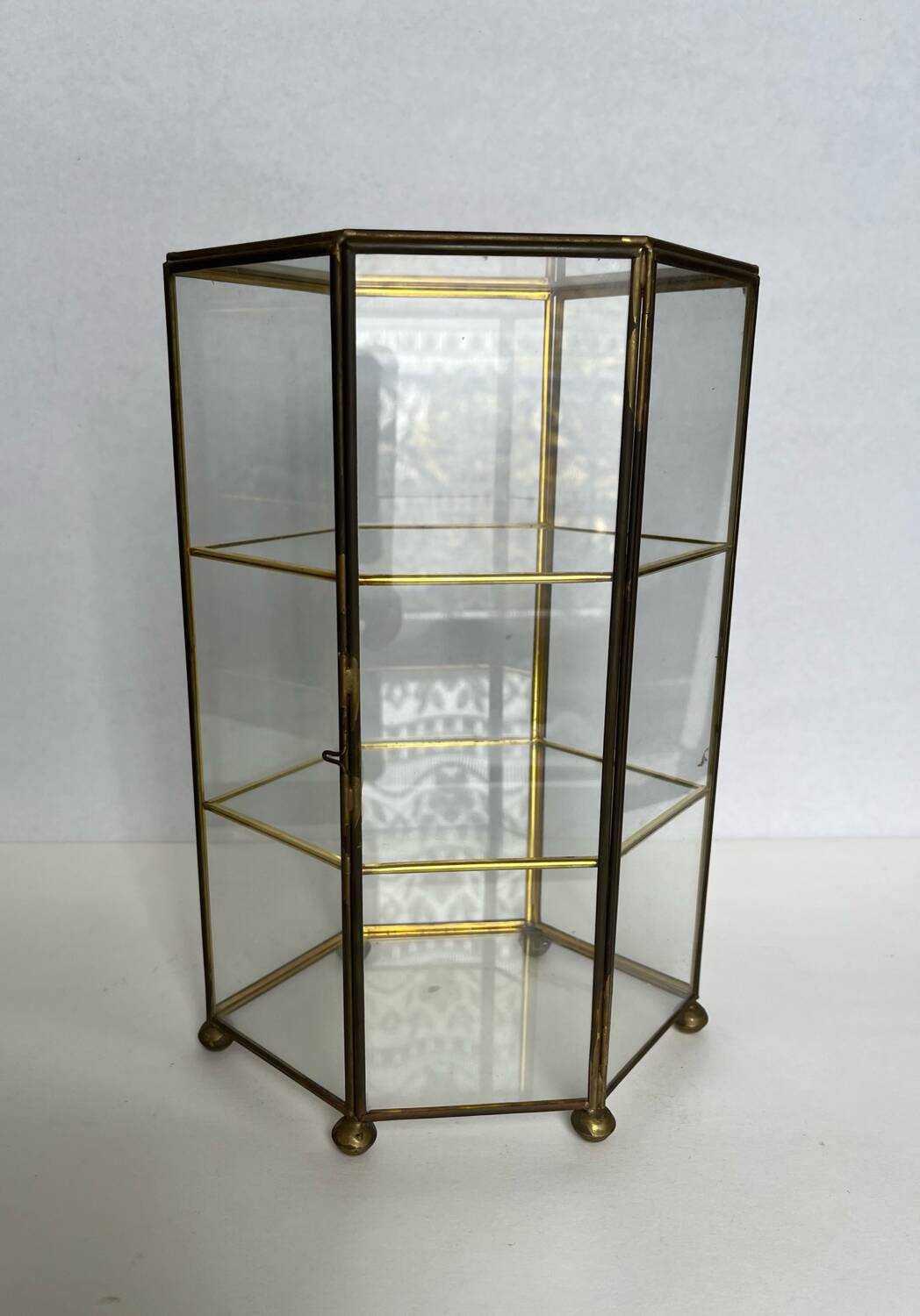 Small glass shelf on feet