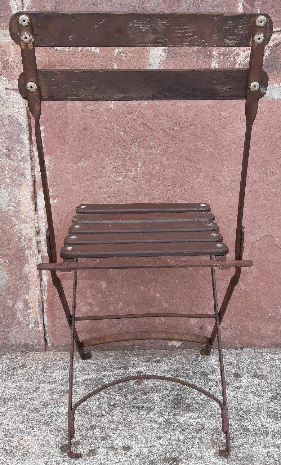 Foldable wrought iron chair