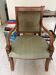 Fauteuil Empire en bois sculpté