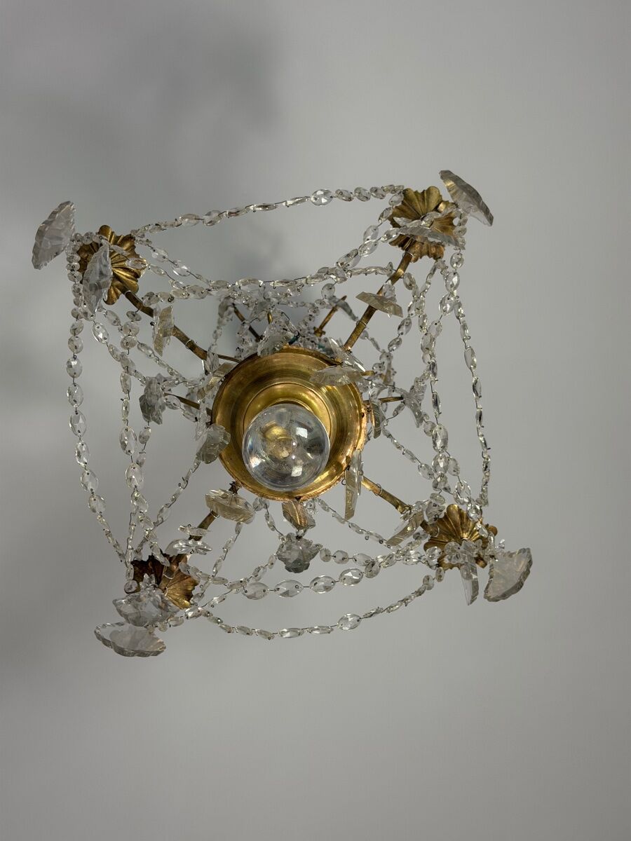 Bronze chandelier with cut crystal pendants, circa 1800.