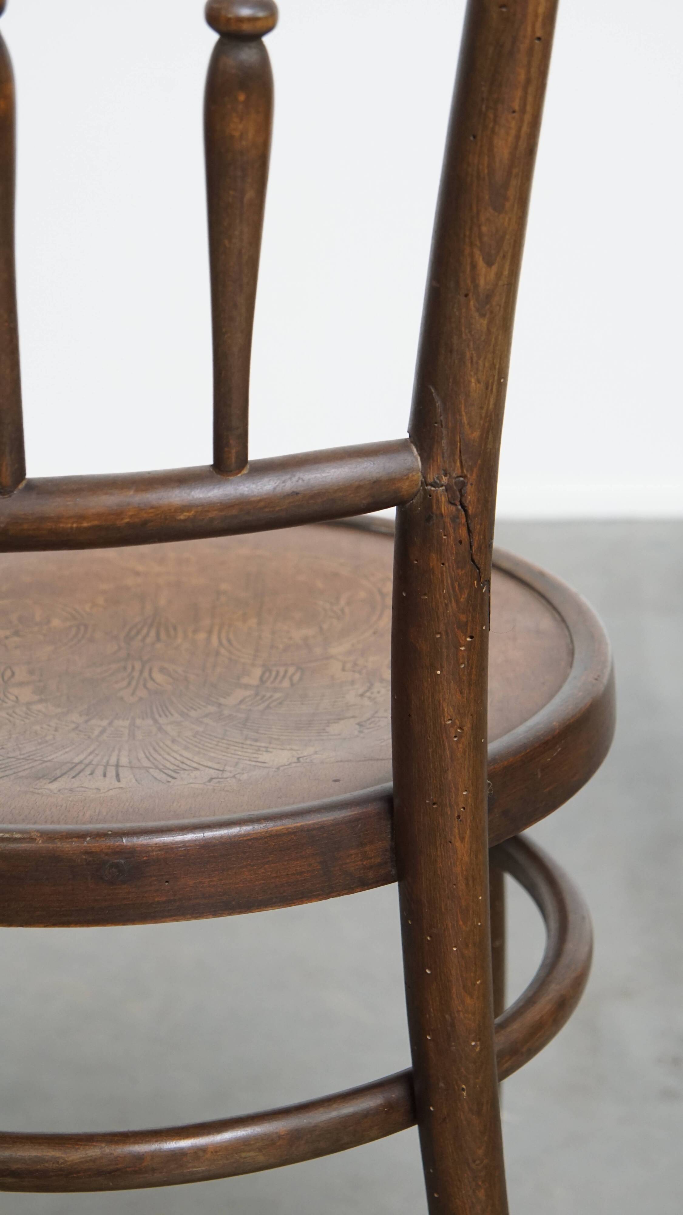 Bistro chair with carved seat