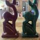 Pair of Art Deco deer by Charles Lemanceau in red and green ceramic.