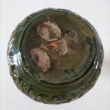 Small glazed vase with raised floral decoration