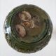 Small glazed vase with raised floral decoration