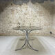 Smoked glass oval table from the 1970s.