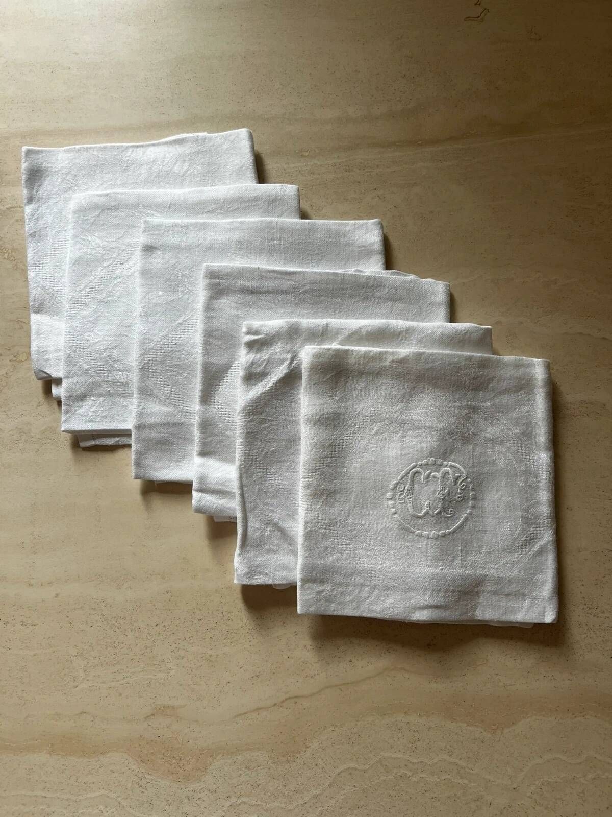 Set of six antique damask napkins with embroidered monogram.