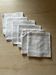 Set of six antique damask napkins with embroidered monogram.