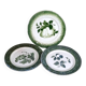 Antique earthenware plates with fruit decoration.