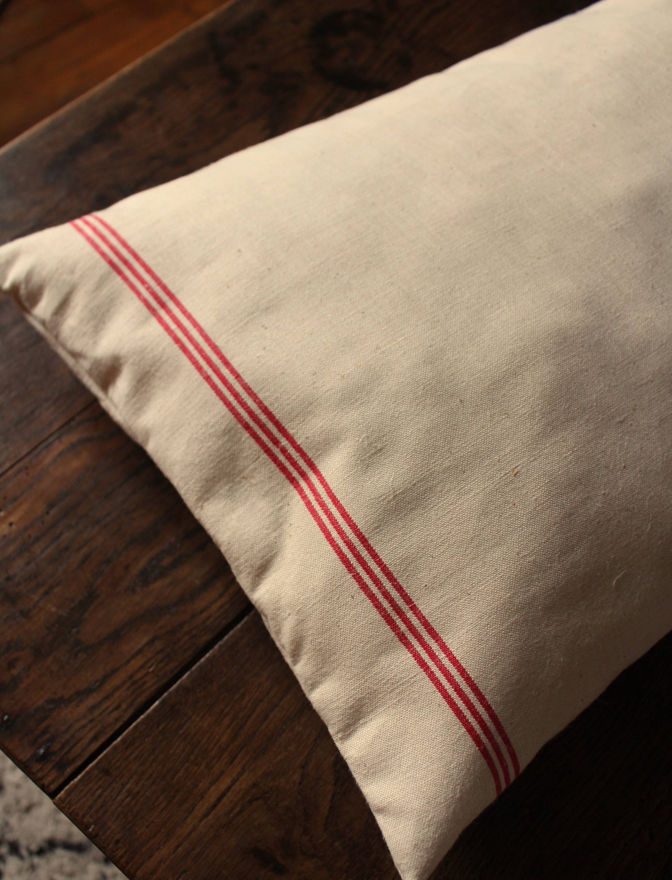 Old red striped Torchon cushion