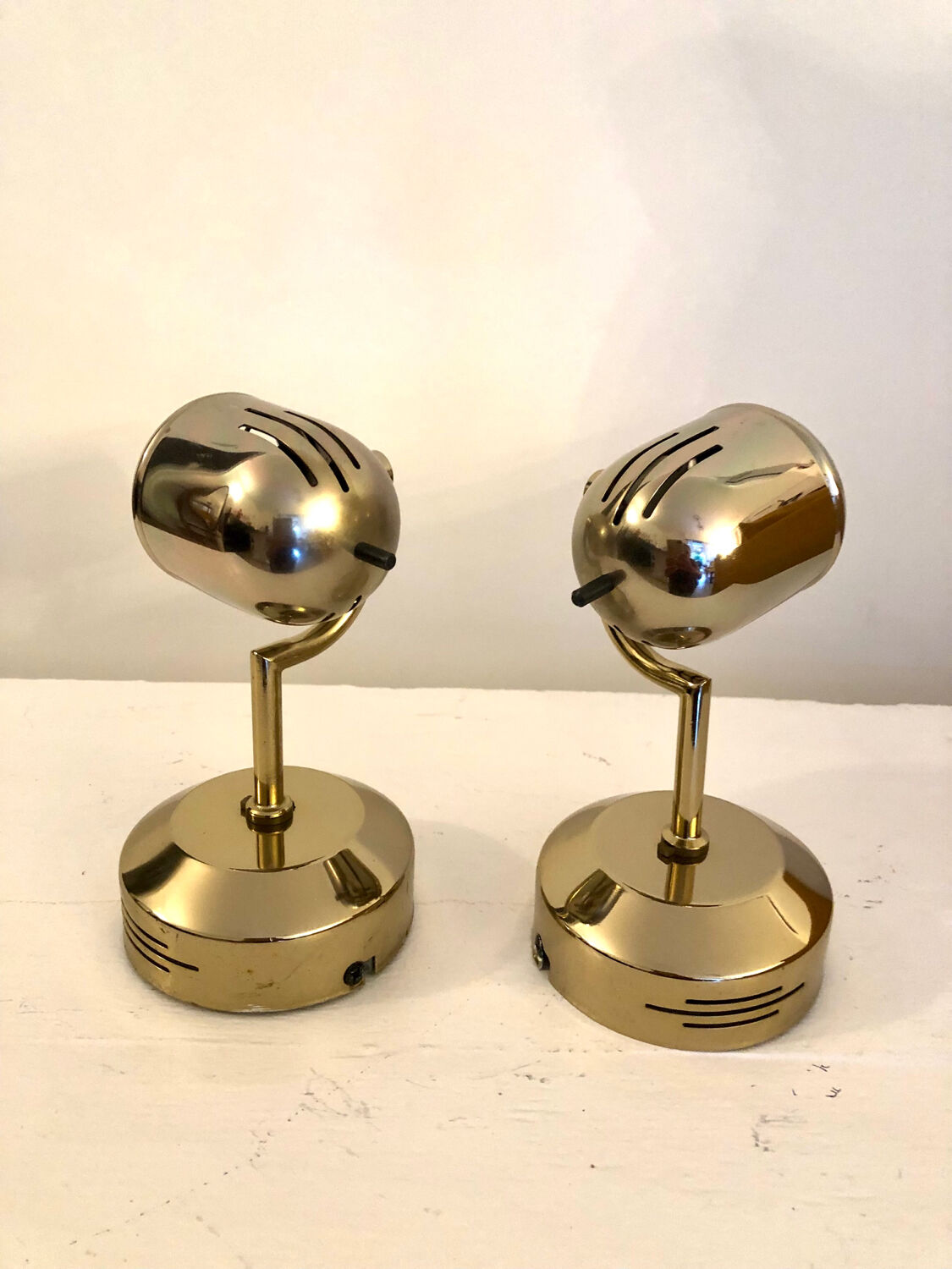 Vintage Fase adjustable wall lights in gold metal.