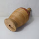 Old bottle dressed in vintage wood rattan