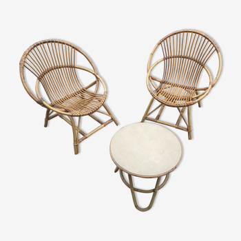 SetTwo armchairs and a rattan table