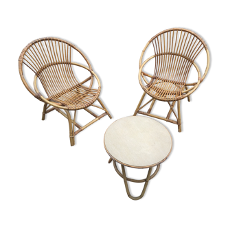 SetTwo armchairs and a rattan table