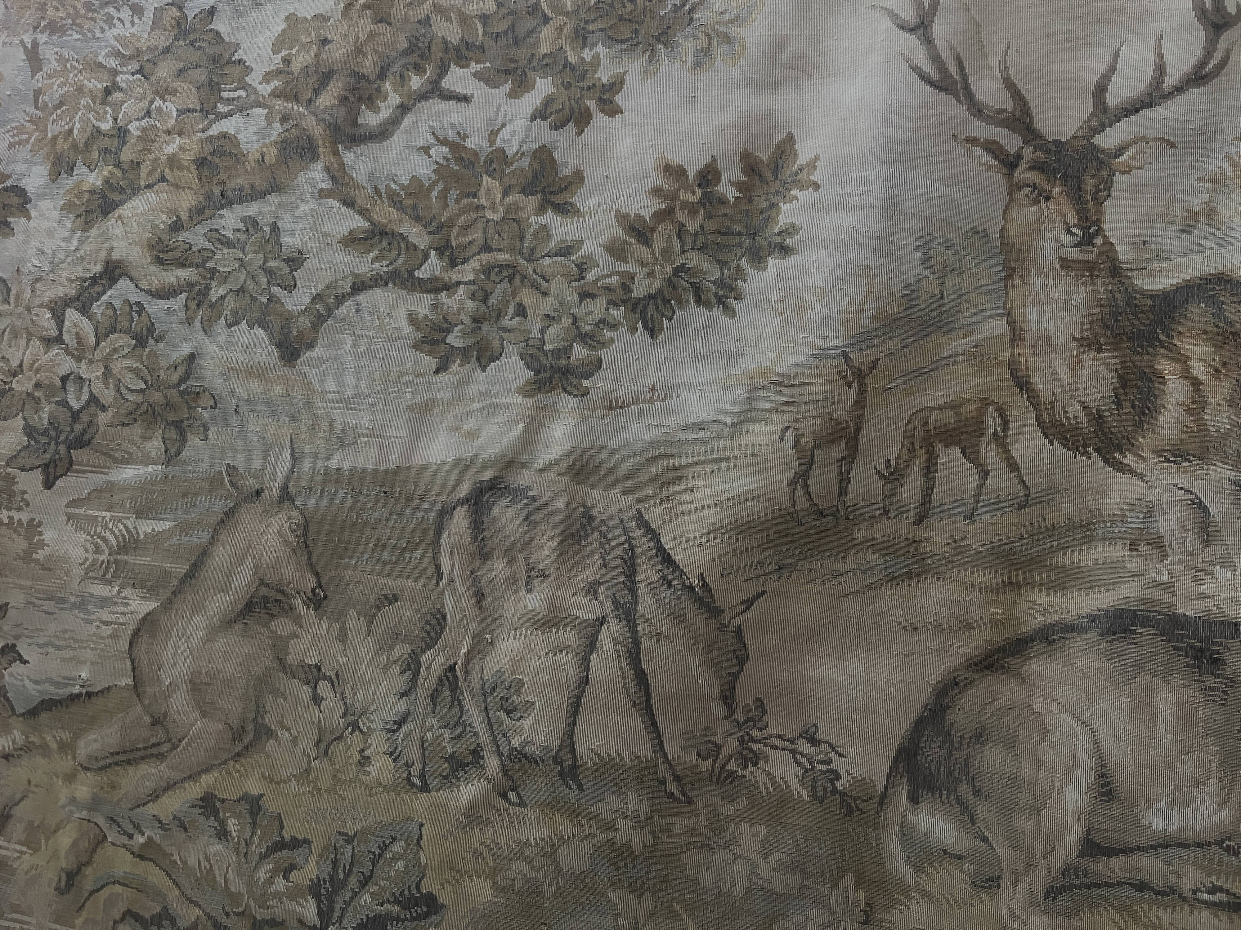 Renaissance-style tapestry with animal motifs, 20th century.
