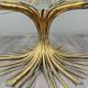 Gold metal and glass coffee table, 20th century, in the style of Robert Goos.
