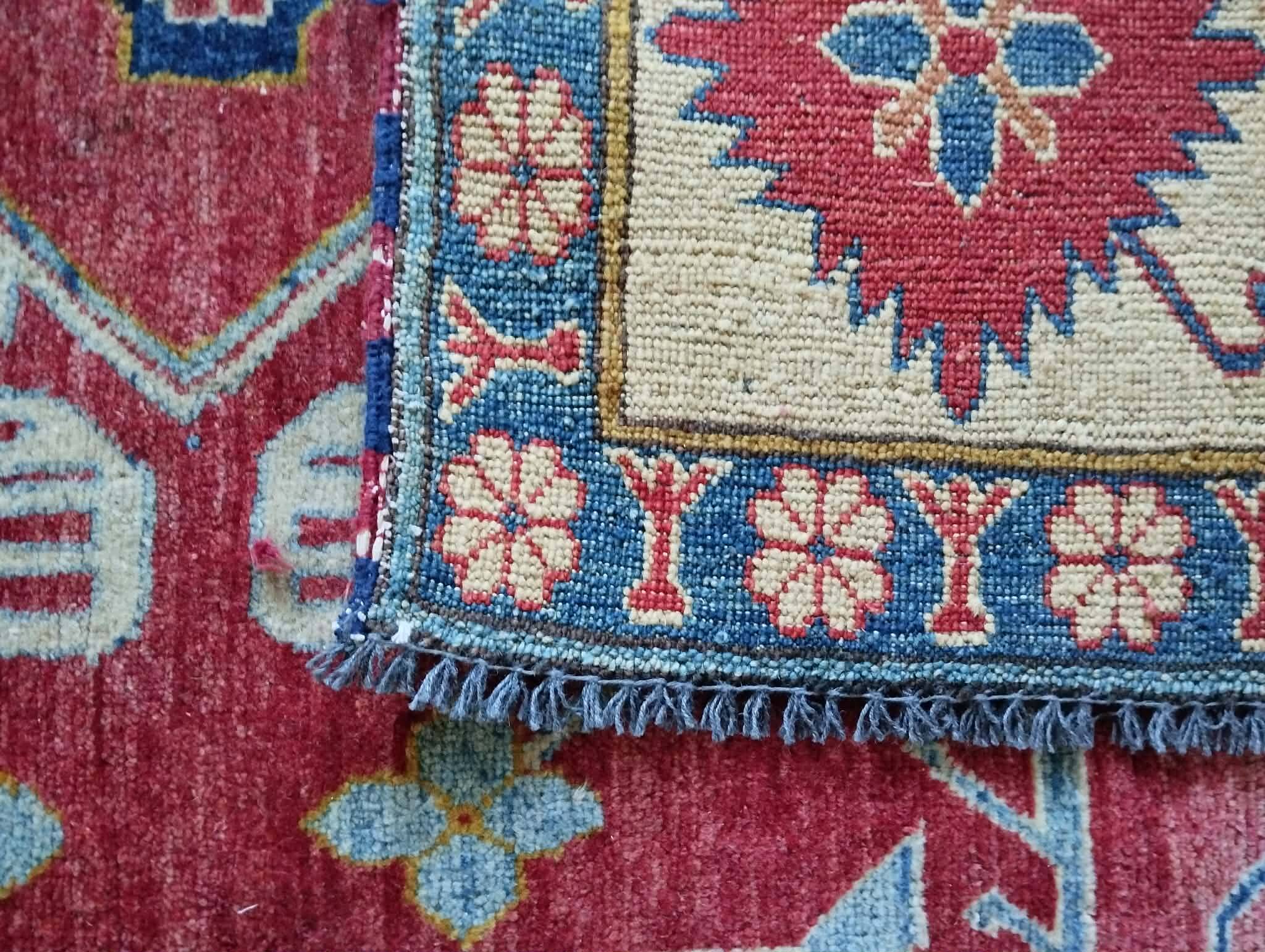 Handmade Pakistani Kazak rug 303x225cm