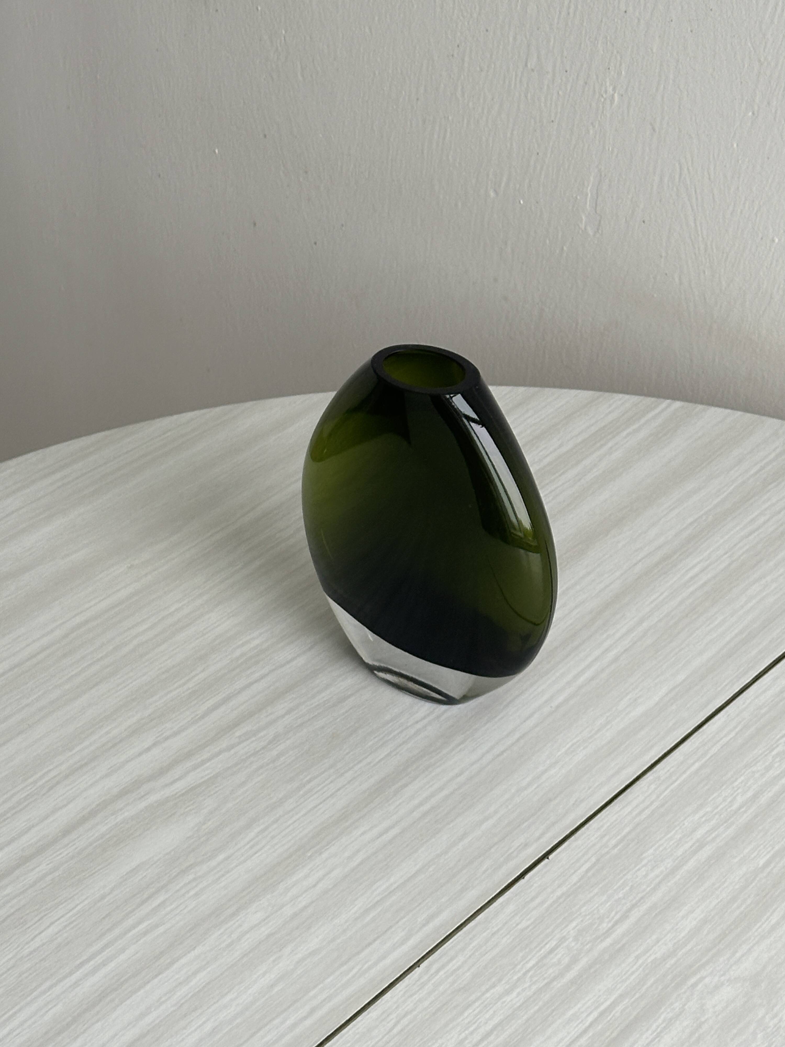 Blown green glass vase