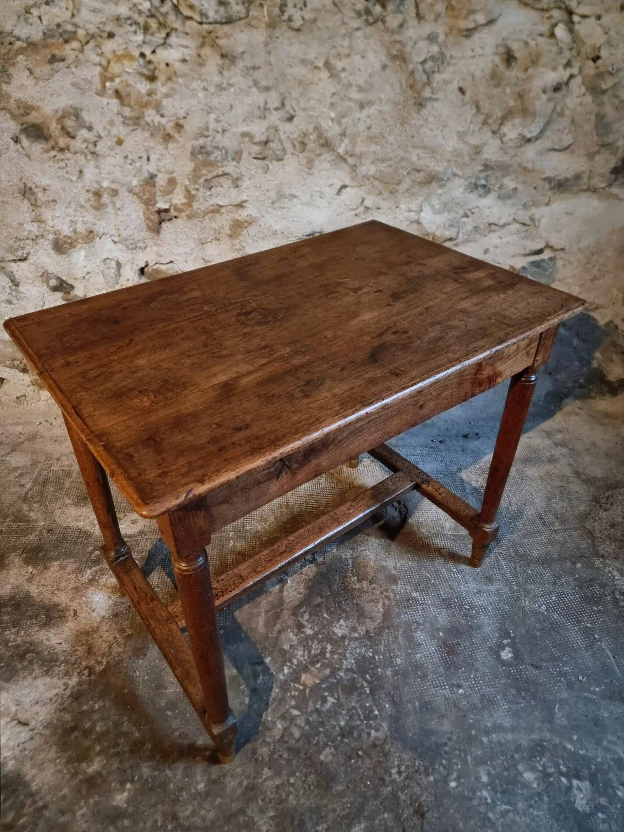 Antique French oak table, writing table from the early 19th century.