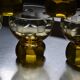 9 small amber art deco glasses