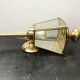 Gold metal lantern wall light with vintage beveled glass