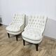 A pair of chesterfield armchairs, England, 1960s