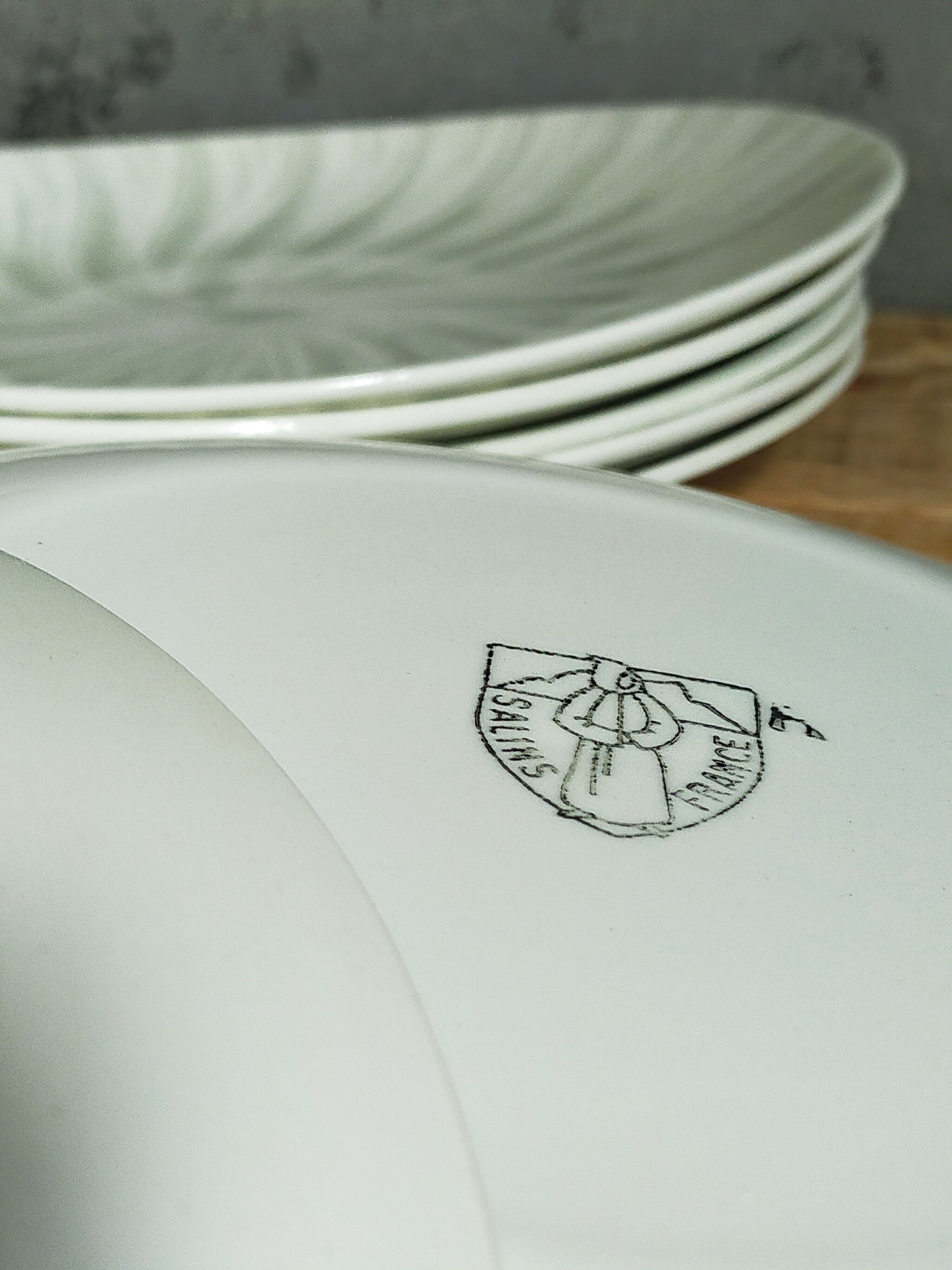 Nine earthenware plates from Salins-les-Bains vintage