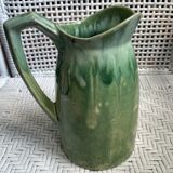 Turquoise green enamelled ceramic pitcher