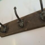 Wooden coat rack and cast iron hooks