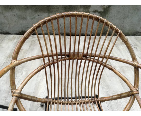 Pair of rattan shell chairs with metallic feet