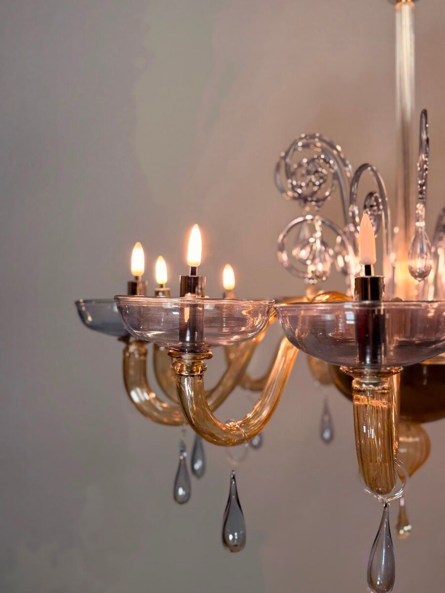 Venetian chandelier in blue and amber Murano glass, 12 light arms, circa 1980.
