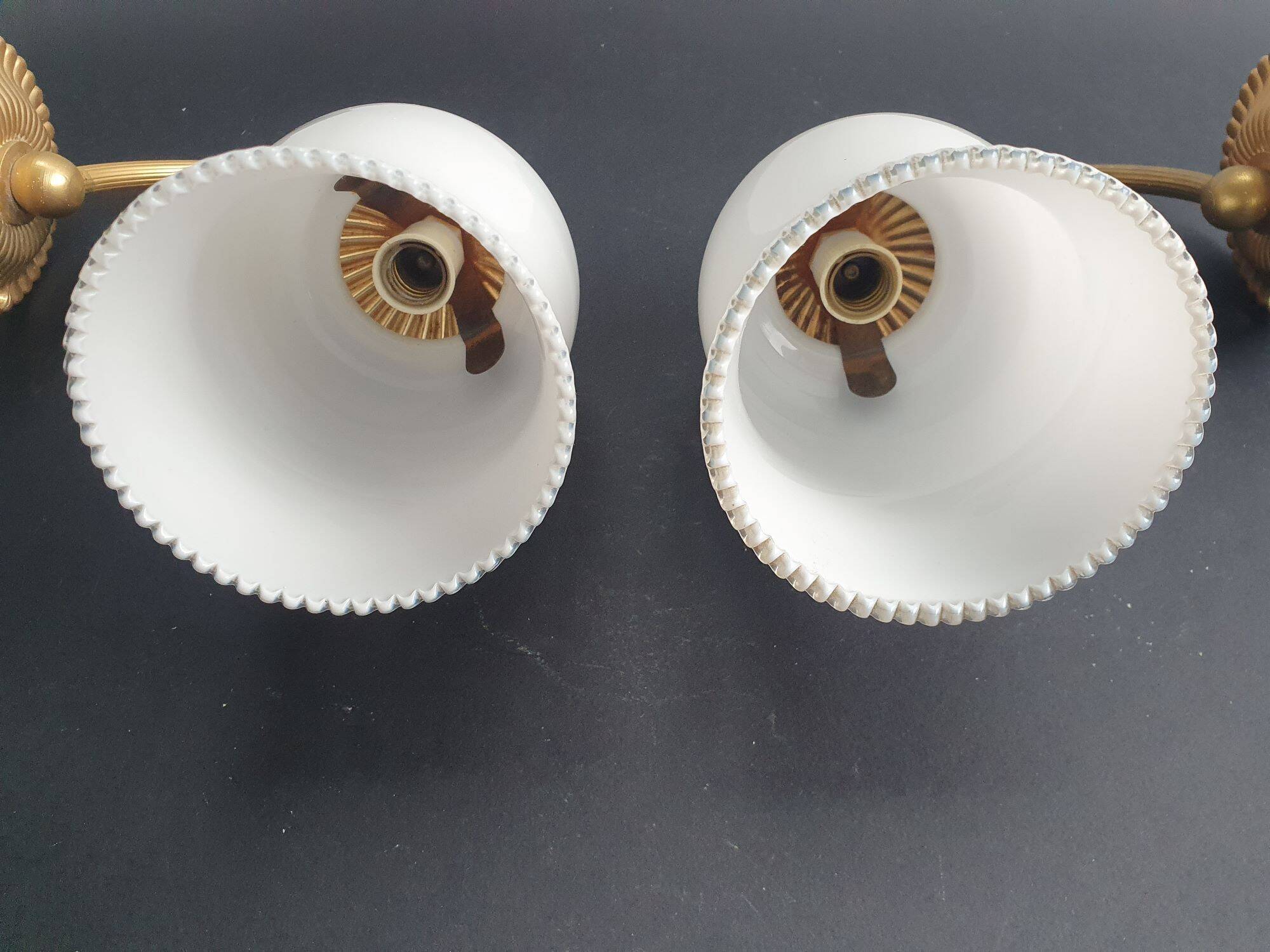 Pair of vintage gold-tone wall sconces with opaline glass globes