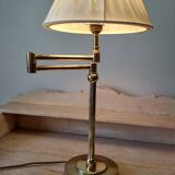 Large golden brass lamp with a movable arm - adjustable desk lamp