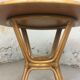 Wooden table and round rattan