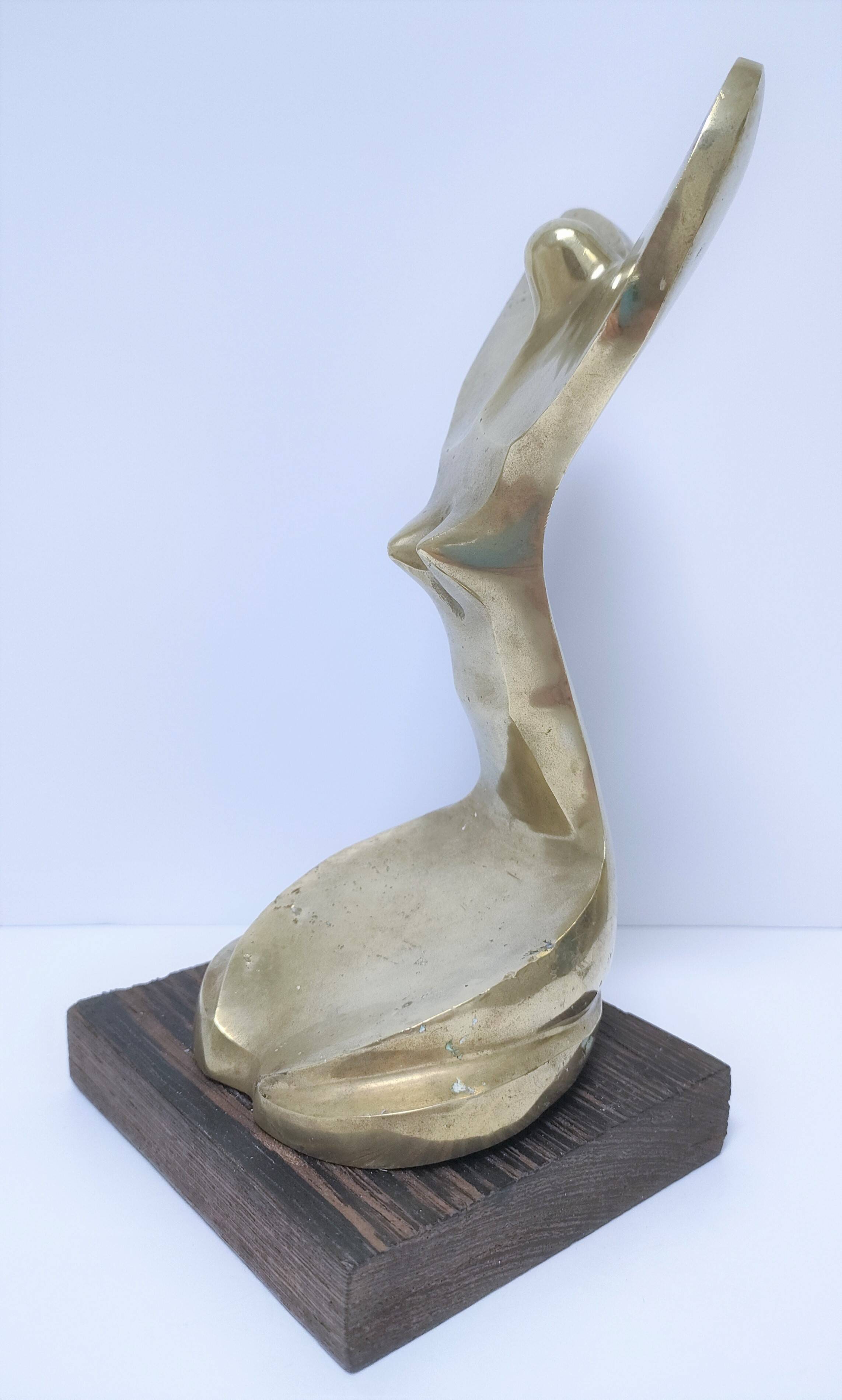 Gilded bronze and sculptural wood paperweight
