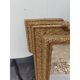 19th-century mirror in gilded wood and stucco.