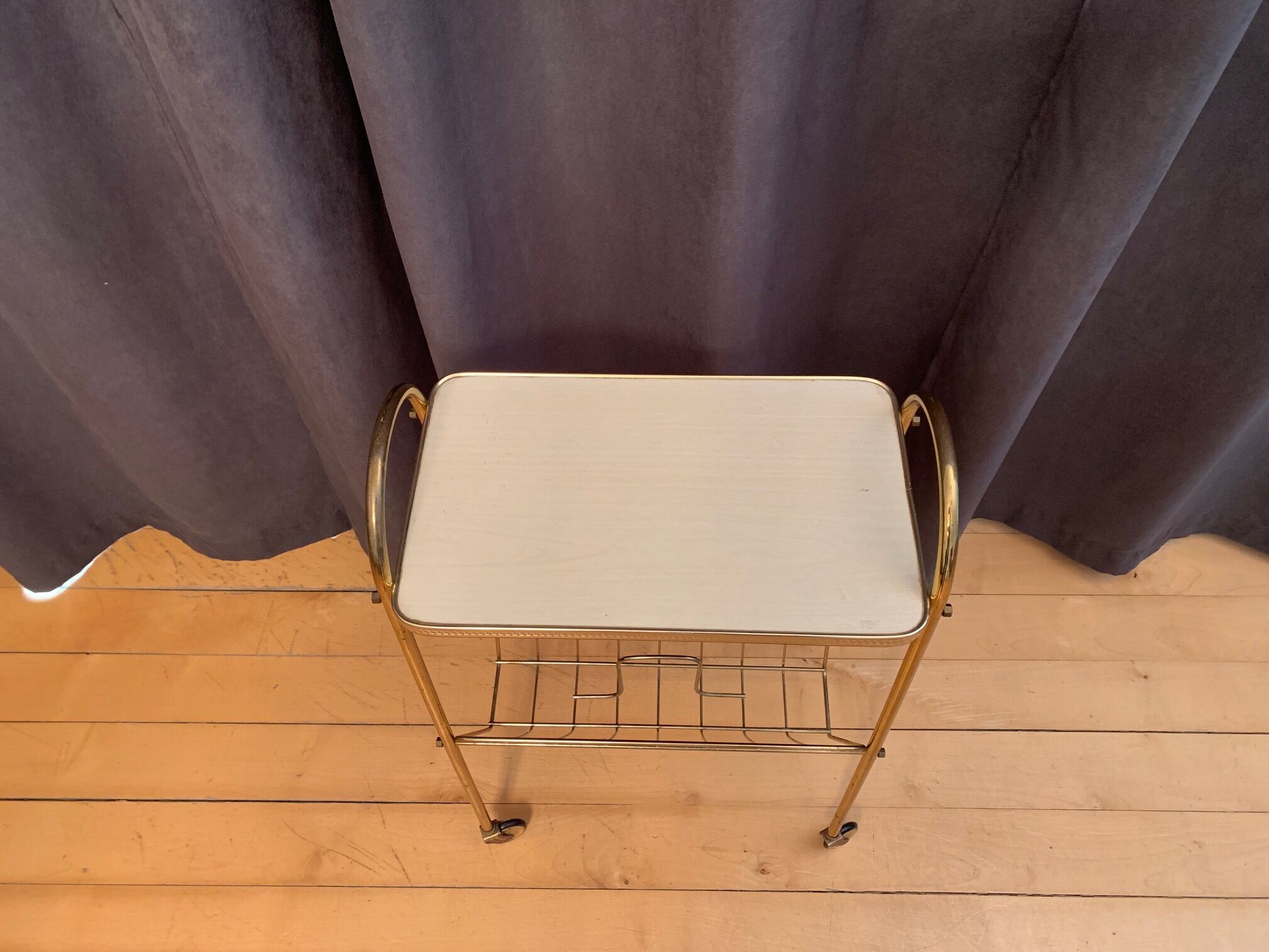 Mobile newspaper holder, 1960s