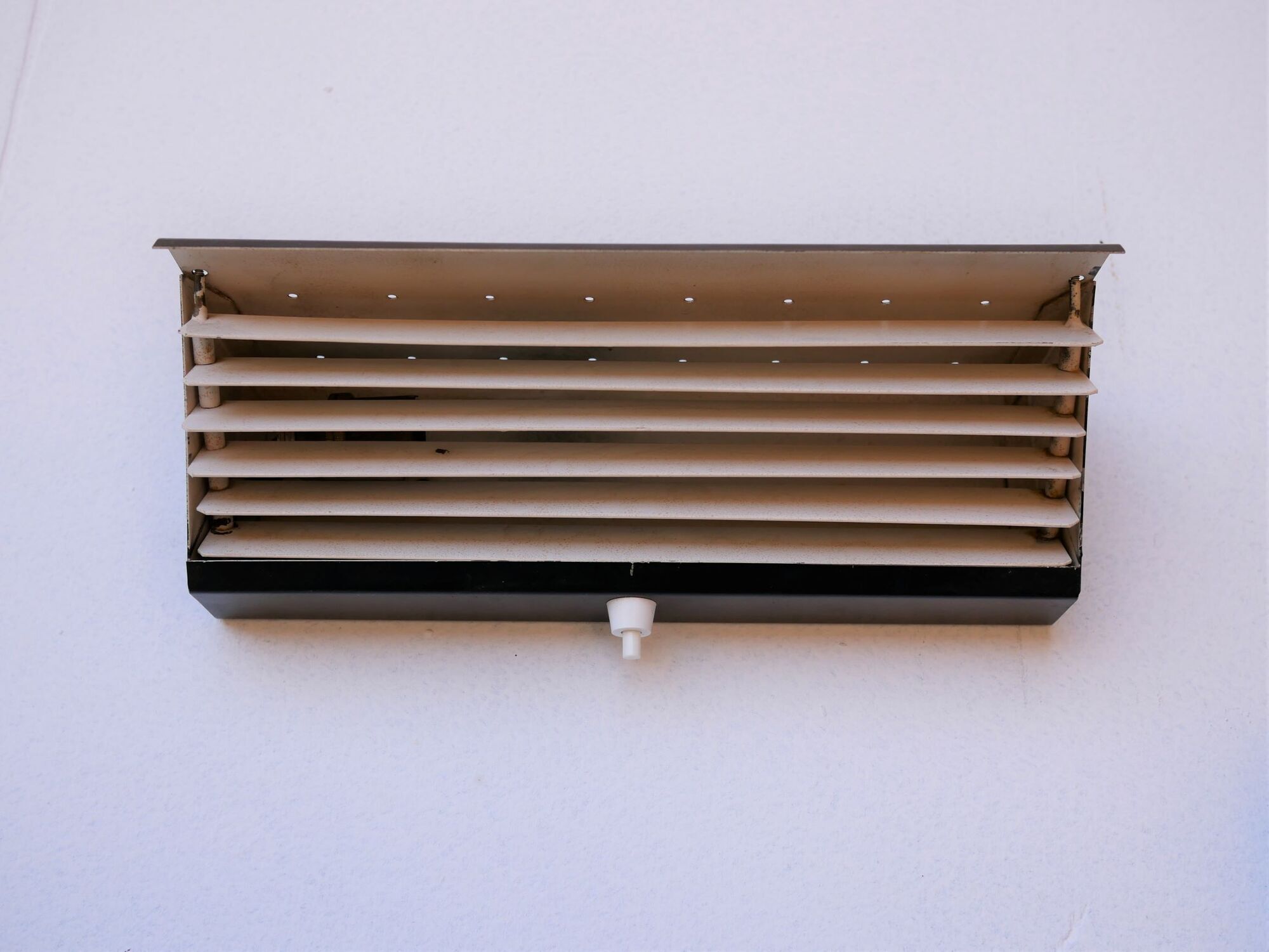Pair of modernist metal wall light model 212, by Jacques Biny for Luminalite