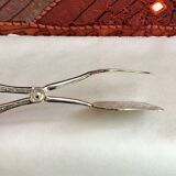 Wrought silver plated cake clips