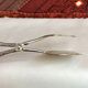 Wrought silver plated cake clips