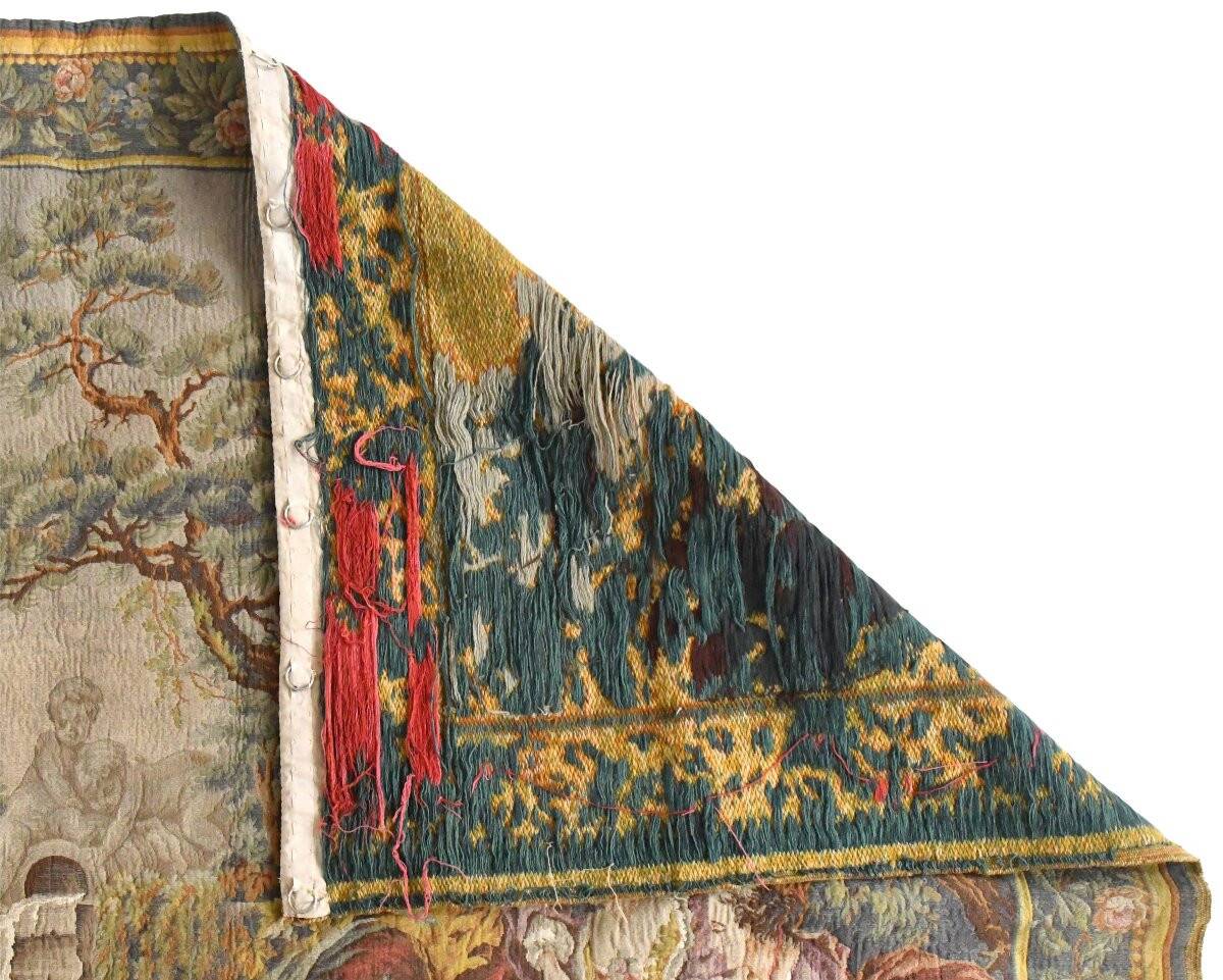 Wall tapestry featuring a pastoral scene.
