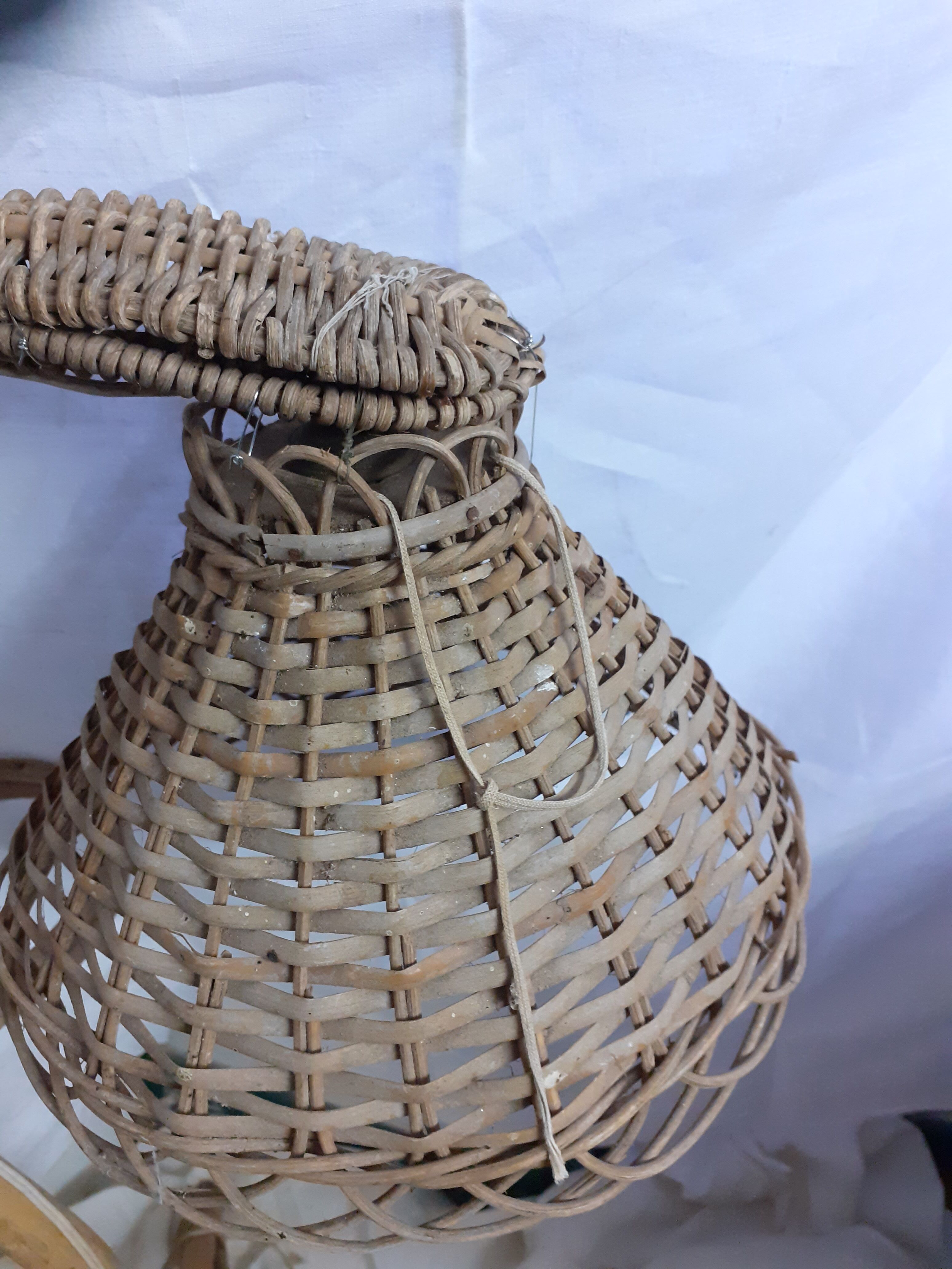 Lamppost door planted in rattan