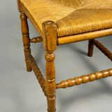 Chaise d'angle vintage en bois avec assise en paille tissée