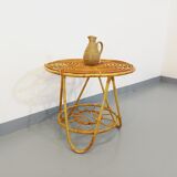 Round coffee table with 60's vintage rattan magazine tray
