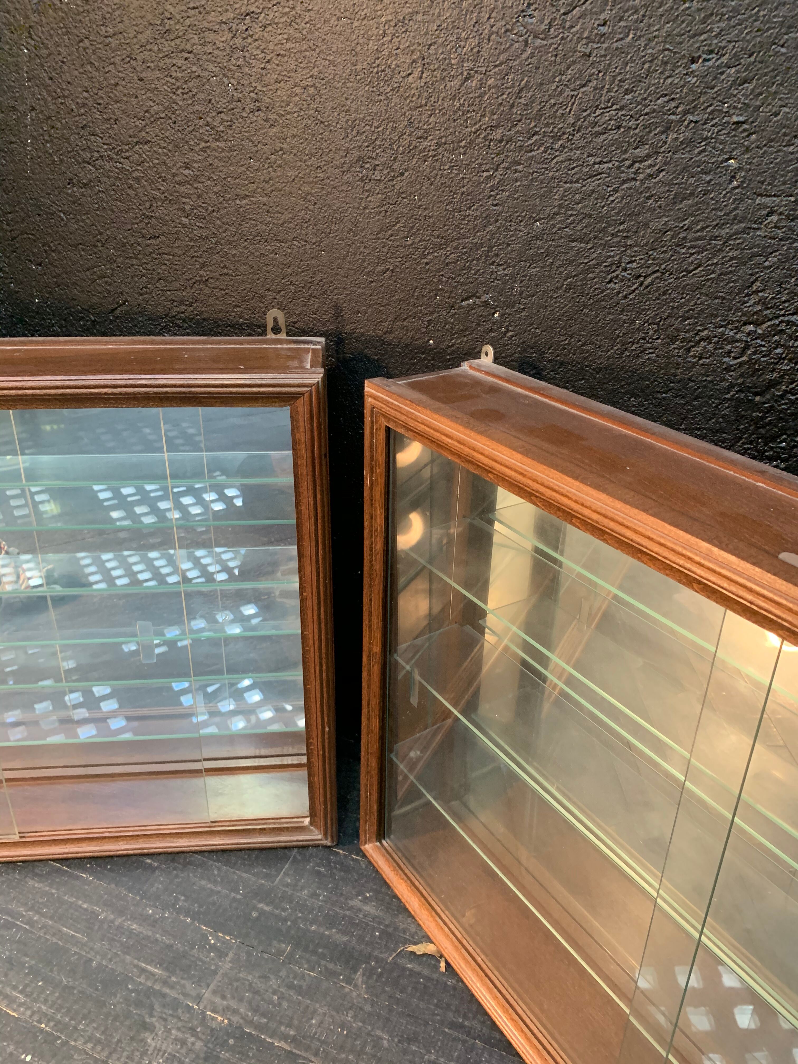 Pair of wooden showcases