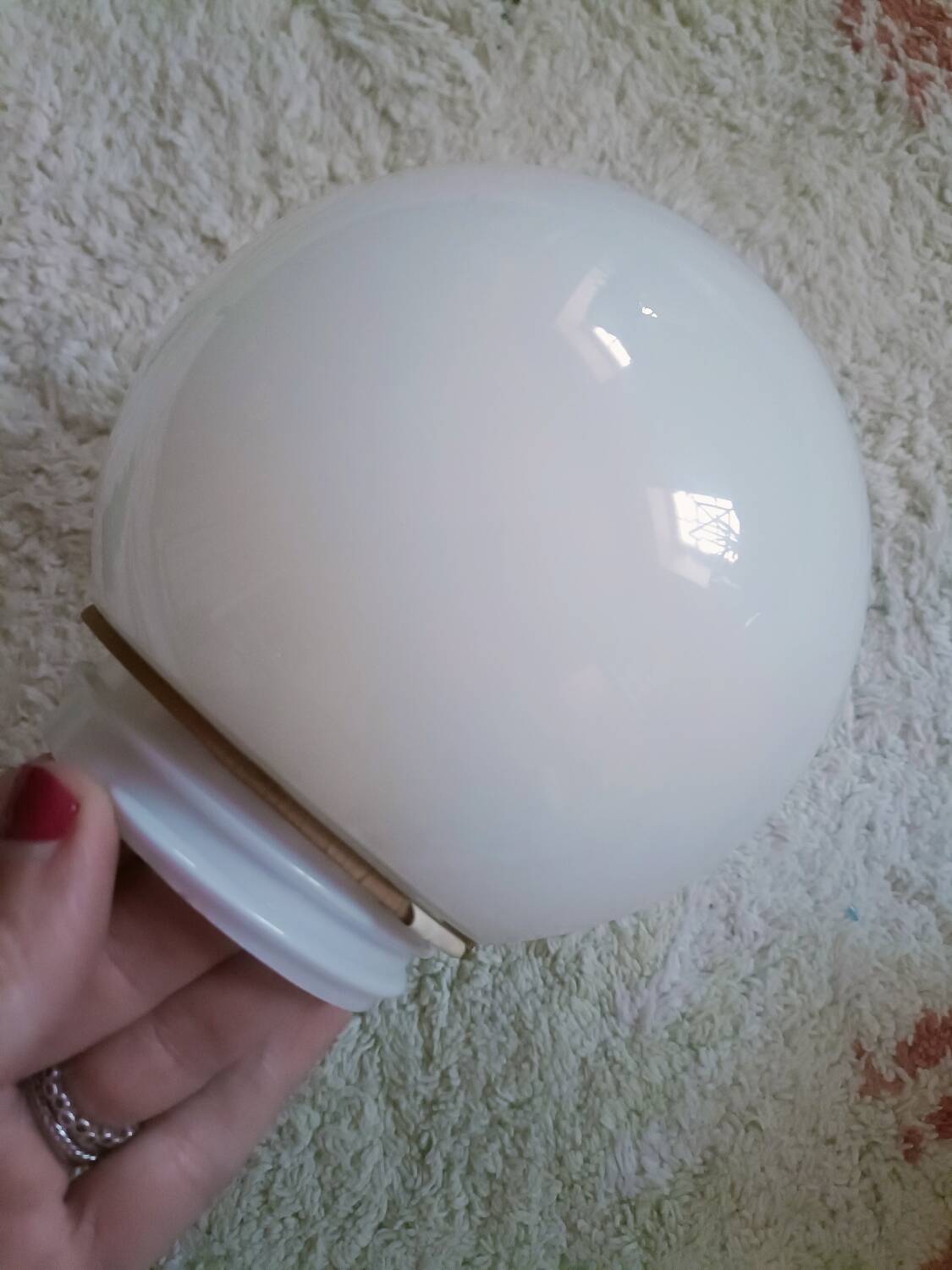 Two opaline glass globe wall lights