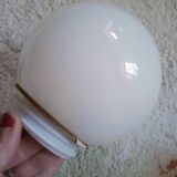 Two opaline glass globe wall lights