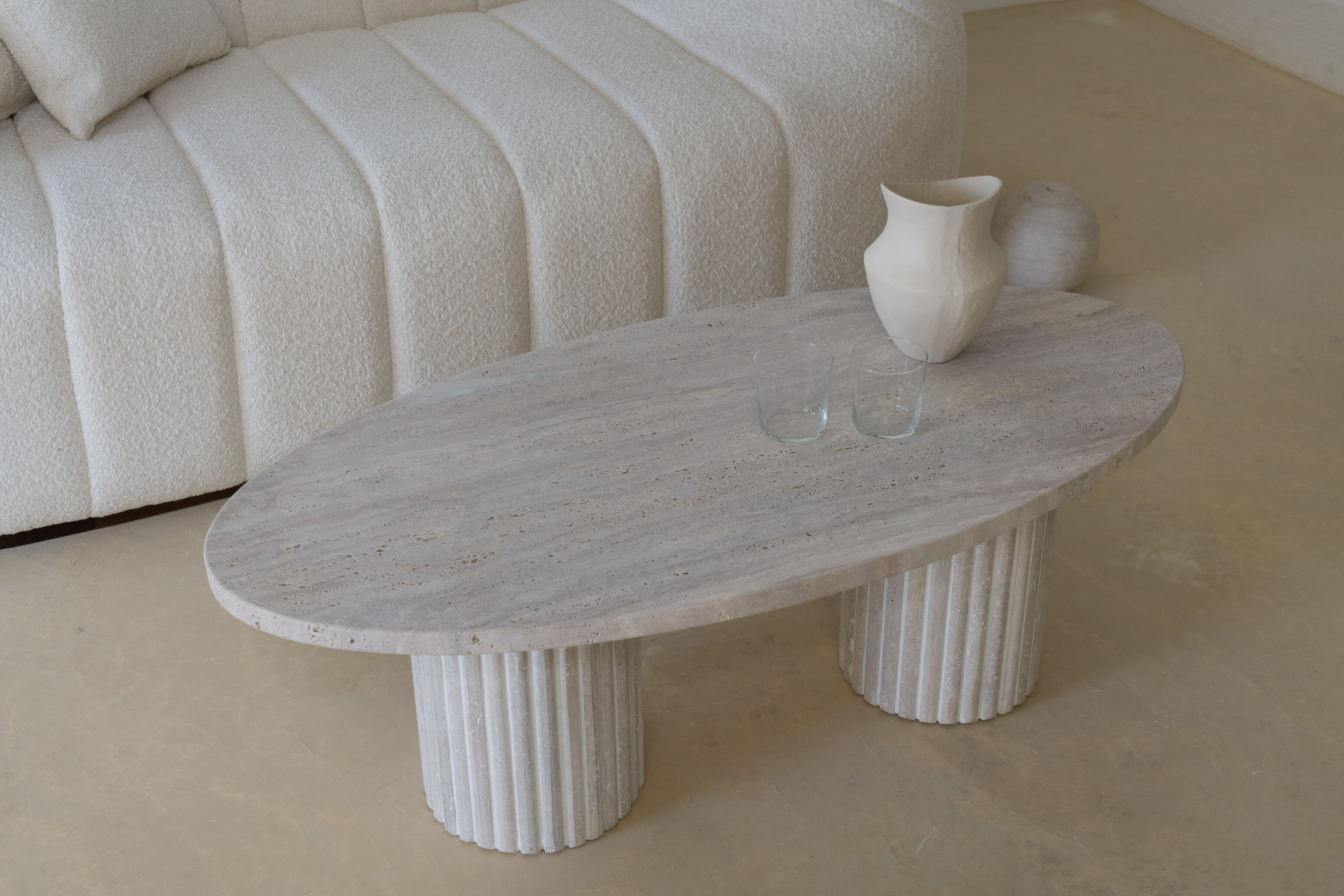 Calypso oval coffee table - natural travertine