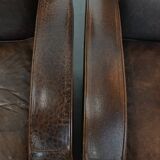 Set of two vintage sheepskin leather design armchairs in a cognac colour