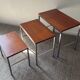 Trio of teak and chrome metal nesting tables from the 60s-70s